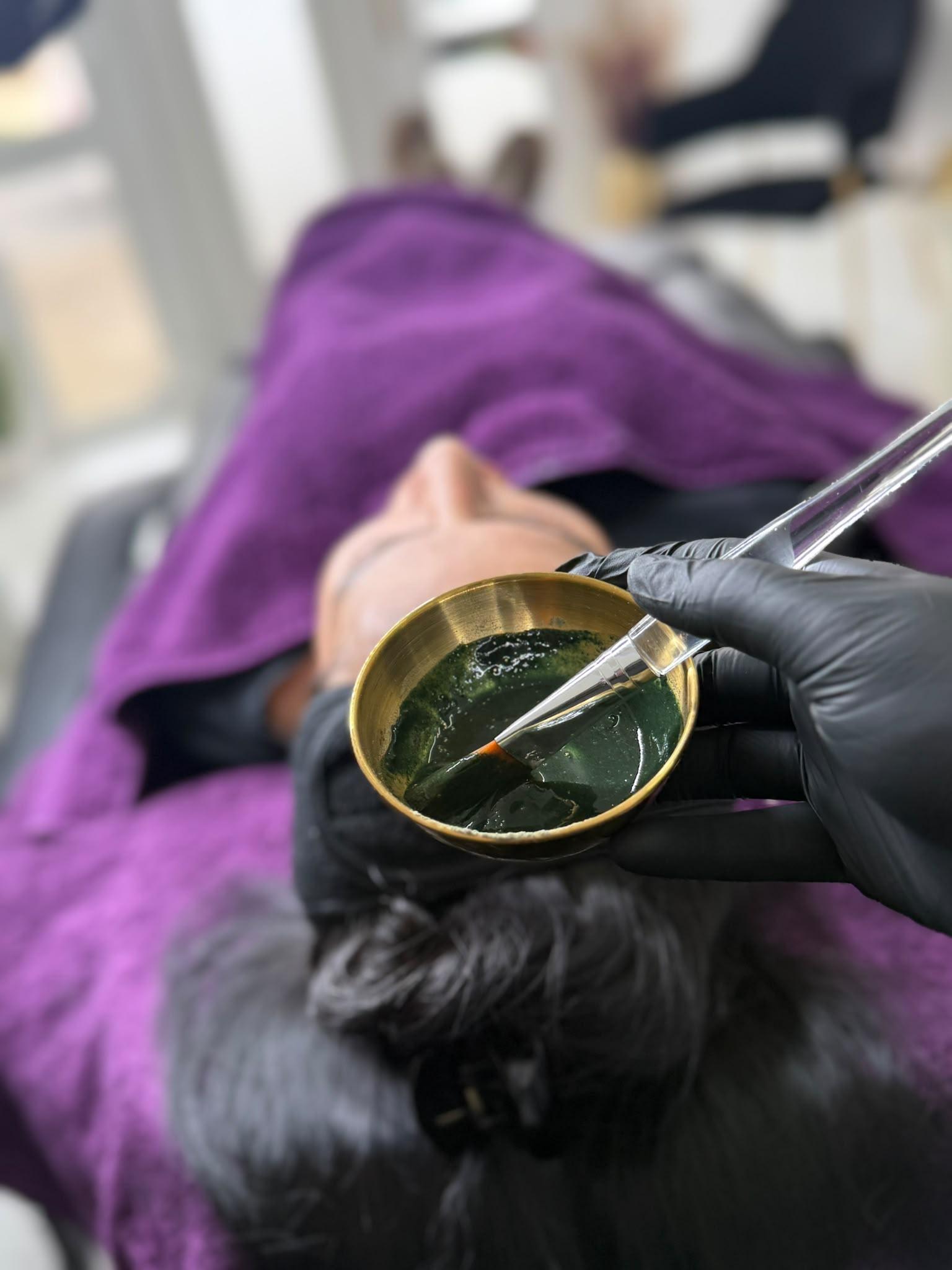 A Green Sea Peel being mixed and applied during a treatment at Luxe 4 You