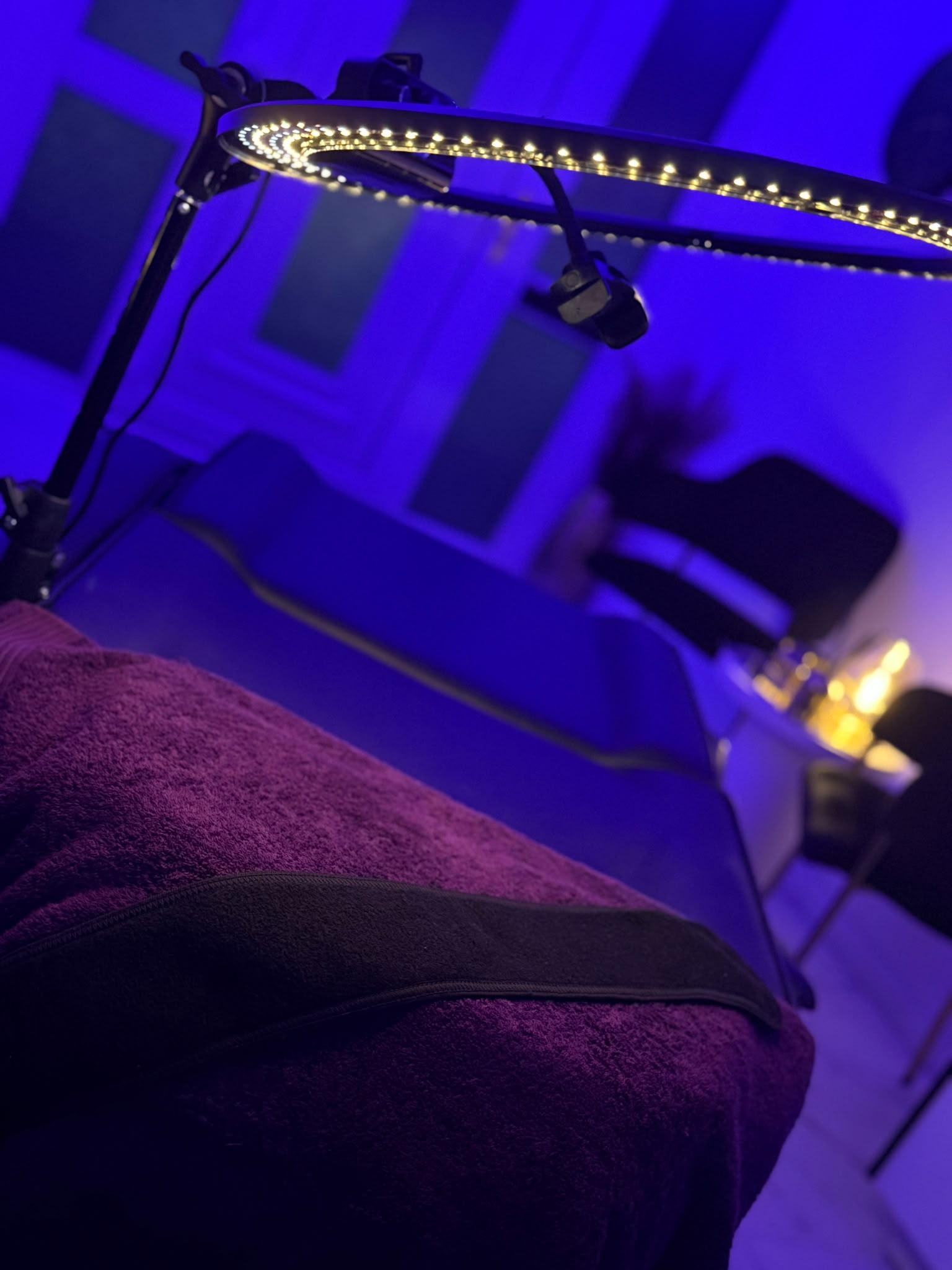 The treatment bed and magnifying lamp in the Luxe 4 You treatment room